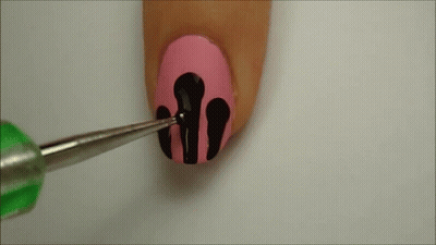 Woman's Nails Painted Pink Black And Green Tip GIF