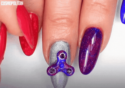 Woman's Nails With Fidget Spinner GIF
