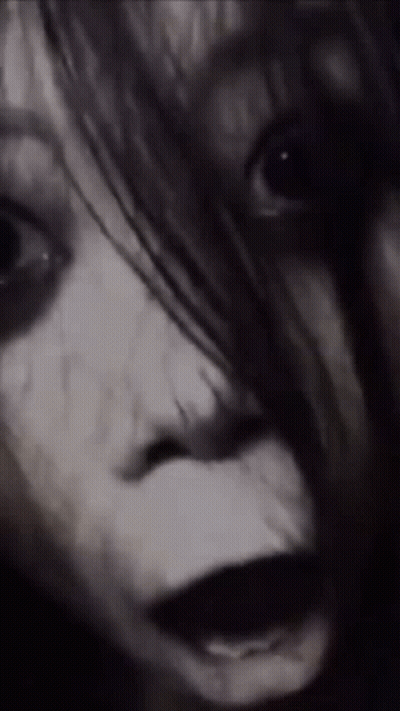 Woman's Scary Face Close Up GIF