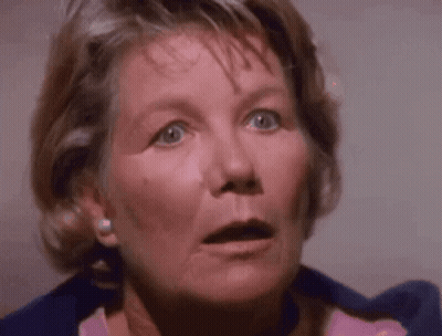 Woman's Surprised Face Close Up GIF