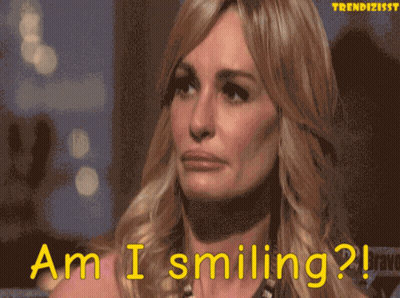 Woman Saying Am I Smiling Pixelated GIF