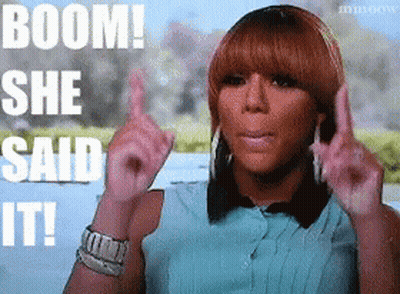 Woman Saying Boom With Fingers GIF