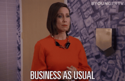 Woman Saying Business As Usual In Bathroom GIF