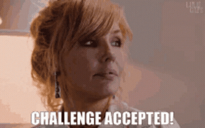 Woman Saying Challenge Accepted Looking At Camera GIF