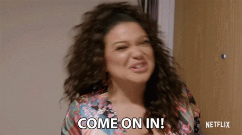 Woman Saying Come On In In Front Of Netflix Logo GIF