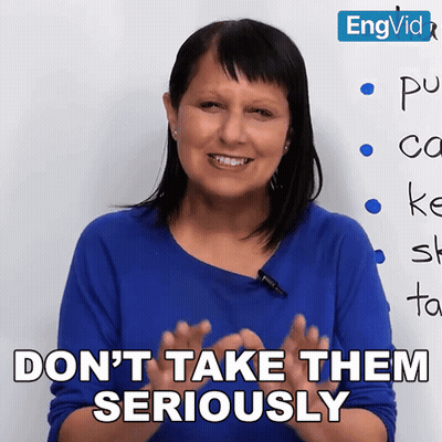 Woman Saying Don't Take Them Seriously In Front Of Whiteboard GIF