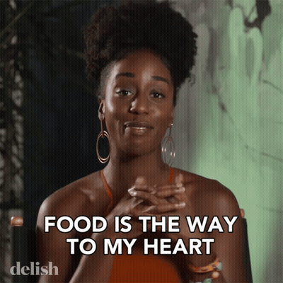 Woman Saying Food Is The Way To Her Heart GIF