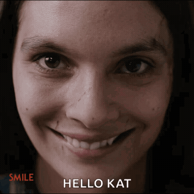 Woman Saying Hello Kat GIF