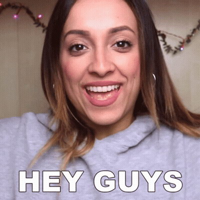 Woman Saying Hey Guys Smiling GIF