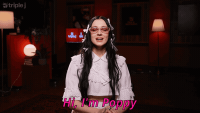 Woman Saying Hi I'm Poppy GIF