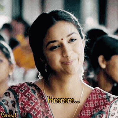 Woman Saying Hmm GIF
