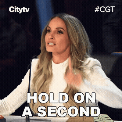 Woman Saying Hold On A Second At Microphone GIF