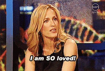 Woman Saying I Am So Loved in Front of Screen