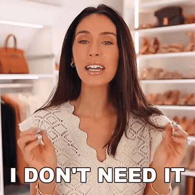 Woman Saying I Don't Need It Closet Full Of Clothes GIF