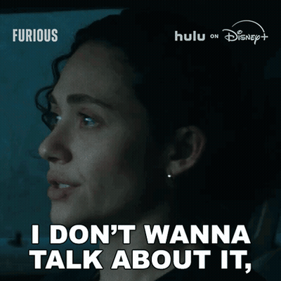 Woman Saying I Don't Wanna Talk About It In Dark Room GIF