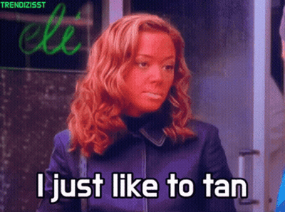 Woman Saying I Just Like To Tan In Purple Jacket GIF