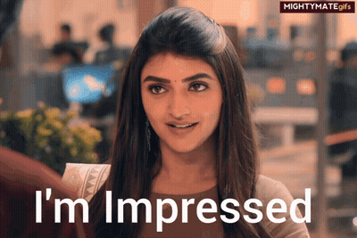 Woman Saying I'm Impressed GIF