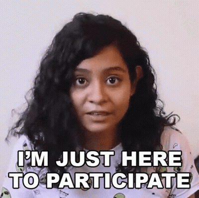 Woman Saying I'm Just Here To Participate GIF