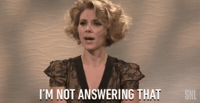 Woman Saying I'm Not Answering That SNL Logo GIF