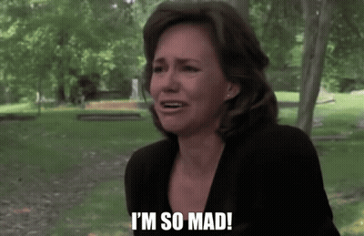 Woman Saying I'm So Mad In Front Of Graveyard GIF