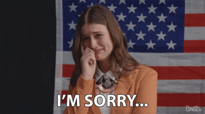Woman Saying I'm Sorry With American Flag GIF