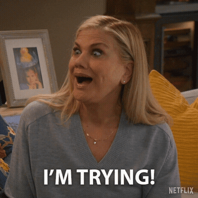Woman Saying I'm Trying In Front Of Netflix GIF