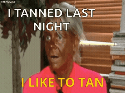 Woman Saying I Tanned Last Night GIF