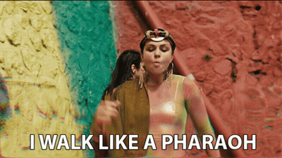 Woman Saying I Walk Like A Pharaoh GIF