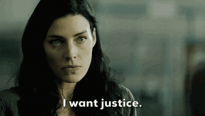 Woman Saying I Want Justice In Dark Room GIF