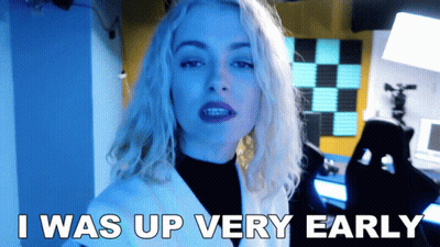 Woman Saying I Was Up Very Early Blue Background GIF