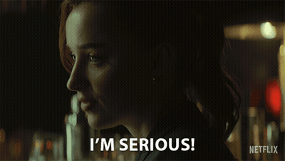 Woman Saying Im Serious In Dark Room GIF