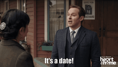 Woman Saying It's A Date Next To Man In Suit GIF