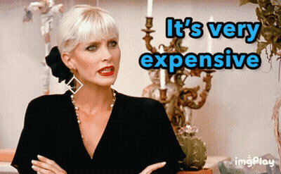 Woman Saying It's Very Expensive With Candle Holder GIF
