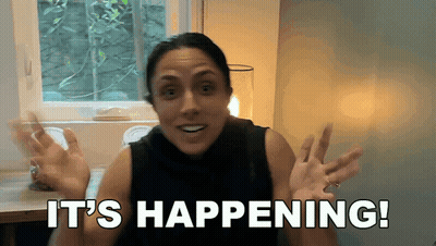 Woman Saying Its Happening Hands Up GIF