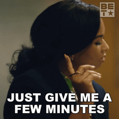 Woman Saying Just Give Me A Few Minutes GIF