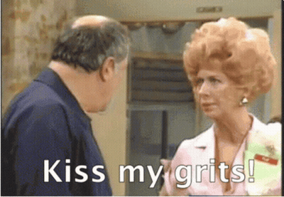 Woman Saying Kiss My Grits Next To Man GIF