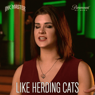 Woman Saying Like Herding Cats GIF