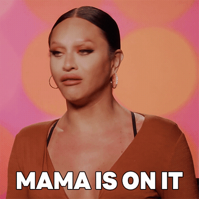 Woman Saying Mama In Front Of Orange GIF