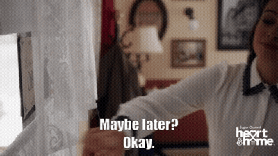 Woman Saying Maybe Later Okay At Super Channel Heart & Home Sign GIF