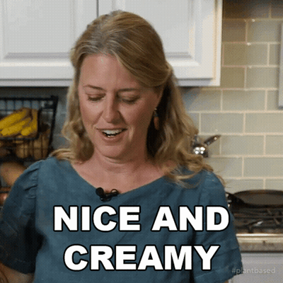Woman Saying Nice And Creamy In Kitchen GIF