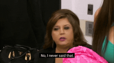 Woman Saying No I Never Said That With Prada Bag GIF