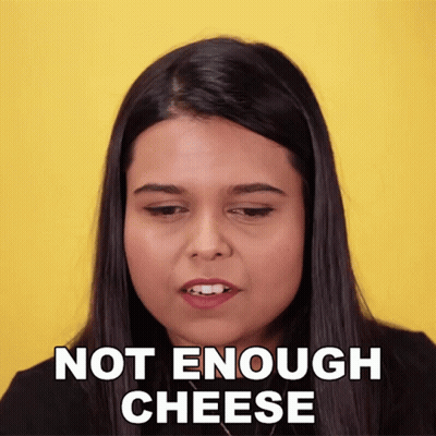 Woman Saying Not Enough Cheese On Yellow Background GIF