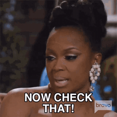 Woman Saying Now Check That In Dress And Earrings GIF