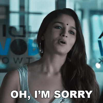 Woman Saying Oh I'm Sorry In Front Of Window GIF