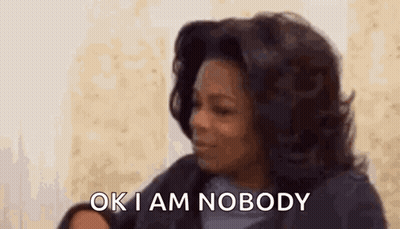 Woman Saying Ok I Am Nobody While Holding Baby GIF