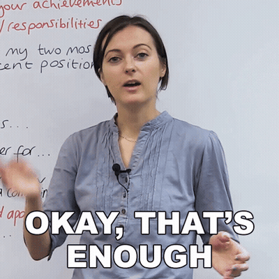 Woman Saying Okay That's Enough In Front Of Whiteboard GIF