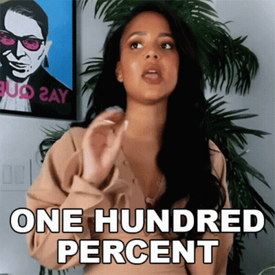Woman Saying One Hundred Percent Beside Man GIF