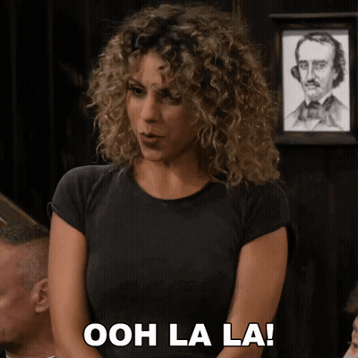Woman Saying Ooh La La In Front Of Man Picture GIF