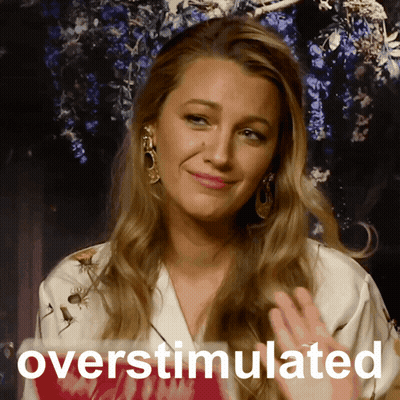 Woman Saying Overstimulated GIF