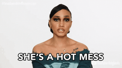Woman Saying She's A Hot Mess On YouTube GIF
